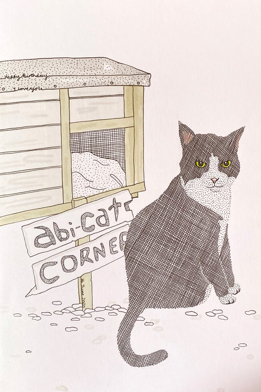 Line drawing of a black and white cat sat in front of a wooden hutch and a sign that reads 'Abi-Cat Corner'. The drawing uses fine lines and various mark making to build up texture and tone alongside pro marker pens to highlight colour.